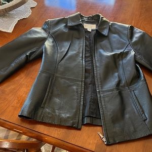 Black leather jacket.  Great condition. Size small petite